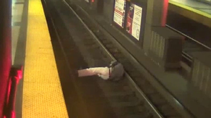 Scary situation: Man falls onto train tracks in Boston
