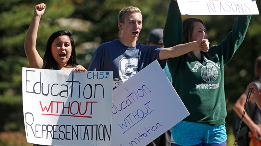 Students stage walkout over controversial history curriculum
