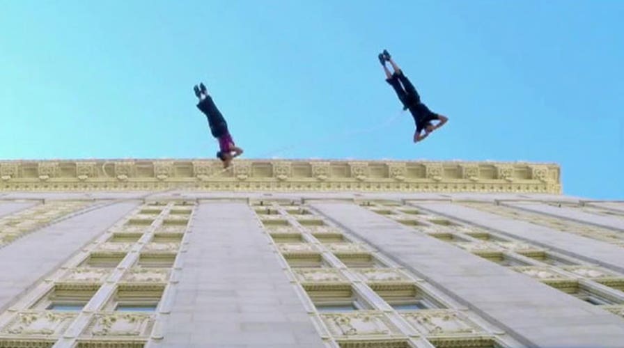 Dancers waltz on walls of Oakland's city hall