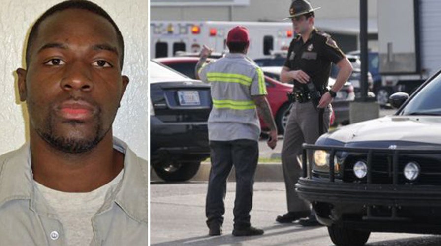 Police say man accused in Okla. beheading is awake