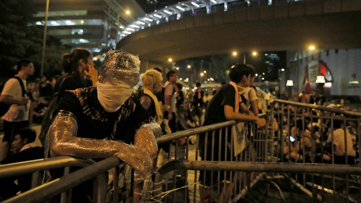 Fallout of unrest in Hong Kong on global economies