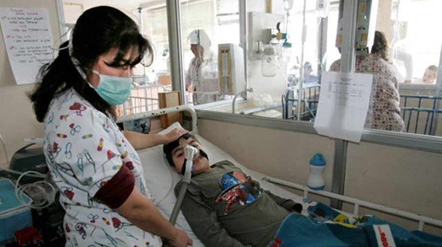 Report: Some virus victims now experiencing paralysis