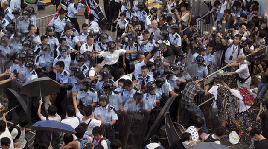 Police clash with democracy demonstrators in Hong Kong
