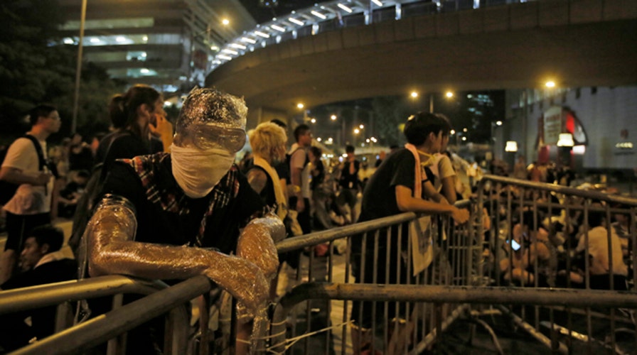 Fallout of unrest in Hong Kong on global economies