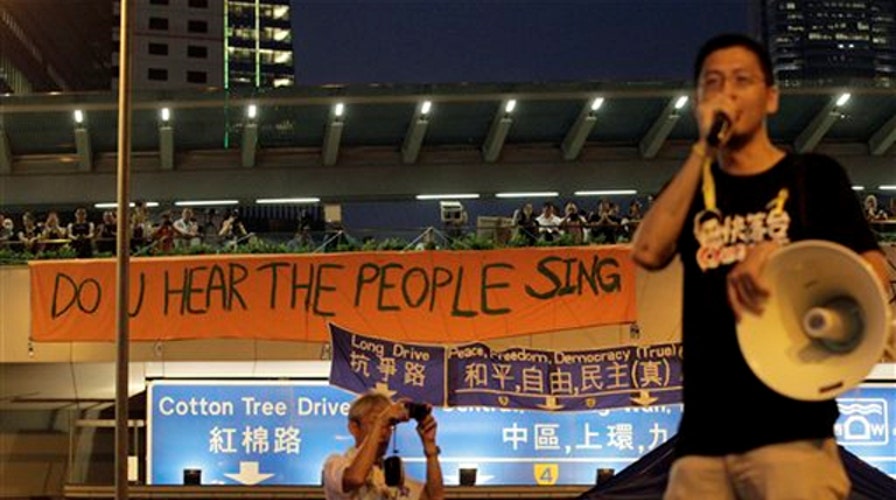 Defiant Hong Kong protestors demand leader step down