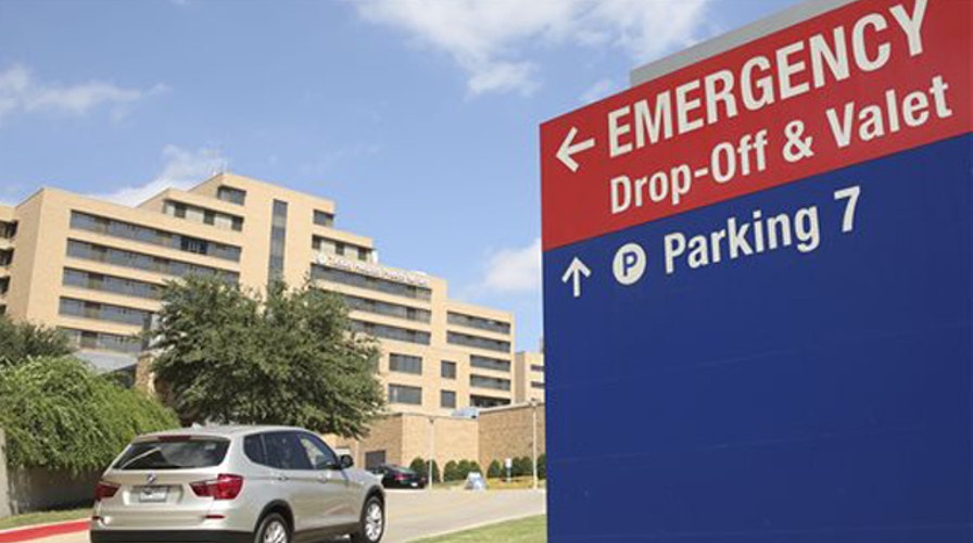 Search widens for anyone who had contact with Ebola patient