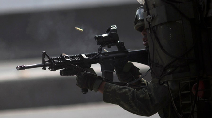 Deadly gun battle between soldiers, gangs on Rio highway