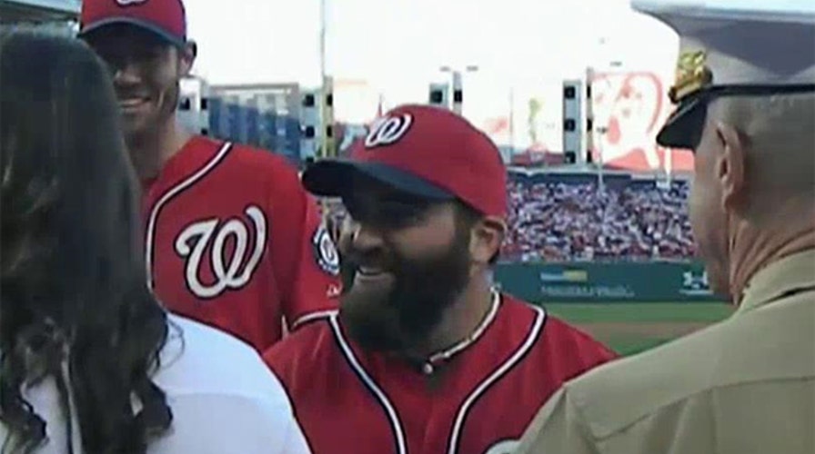 Play Ball: Army veteran grenade tosses opening pitch