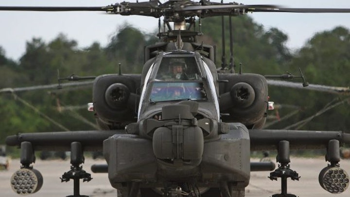 US Apache attack helicopters join fight against ISIS