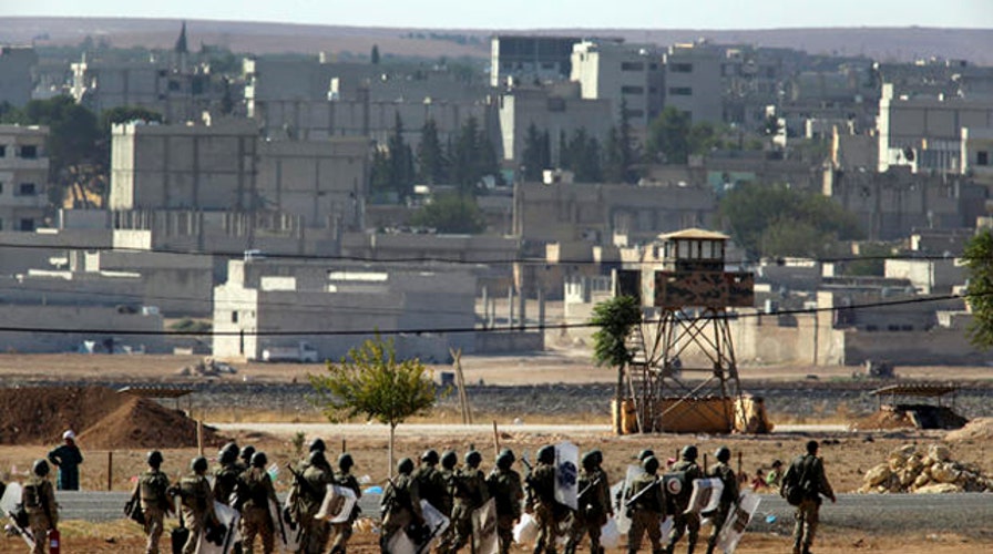 Kurdish fighters struggle to drive ISIS out of Kobani
