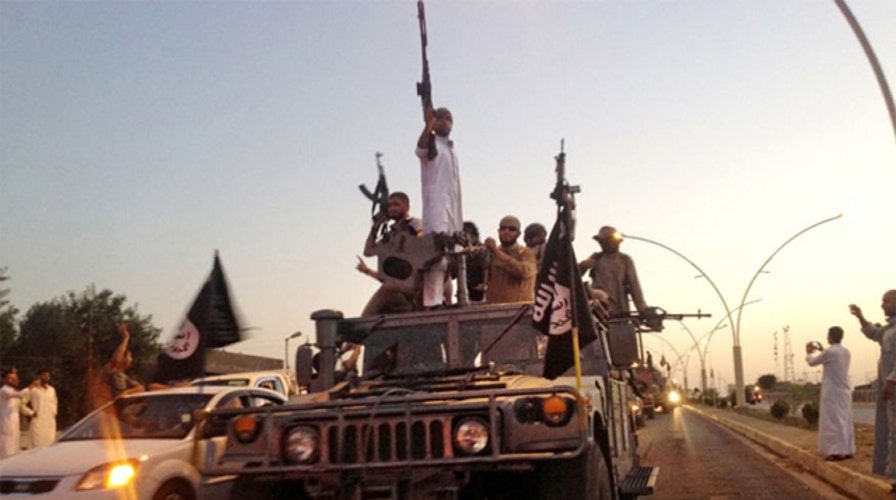 ISIS terrorists take Iraqi army camp as bombs rock Baghdad