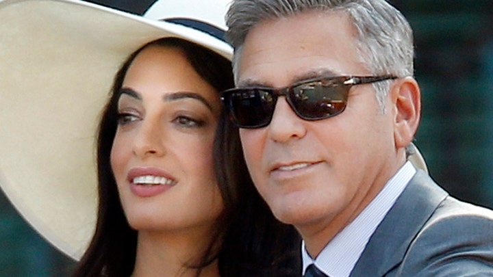 Debate over Amal Alamuddin taking George Clooney's last name