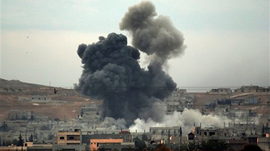 Kurdish fighters battle to reclaim Kobani from ISIS