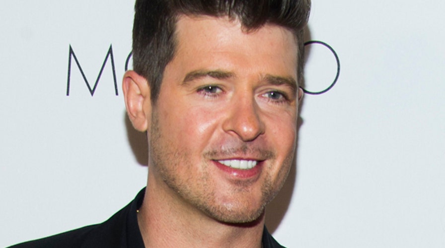 Thicke throws himself divorce party