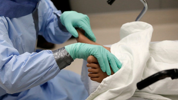 After the 2 nurses, who is most at risk for Ebola?
