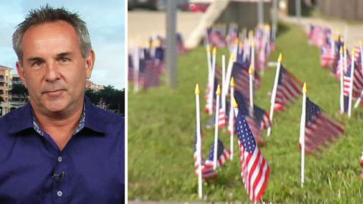 Business owner protests flag fines in Florida 