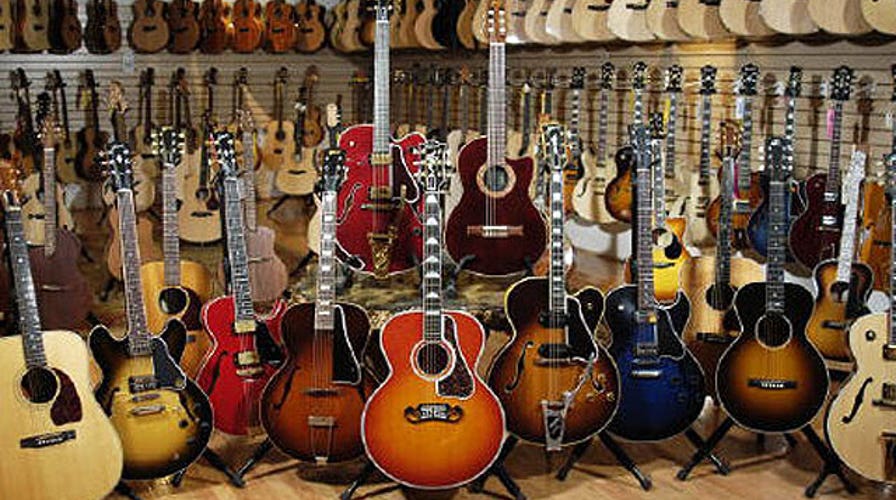 Gibson Guitar bounces back after two government raids