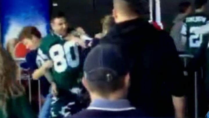 Woman punched in the face by Jets fan