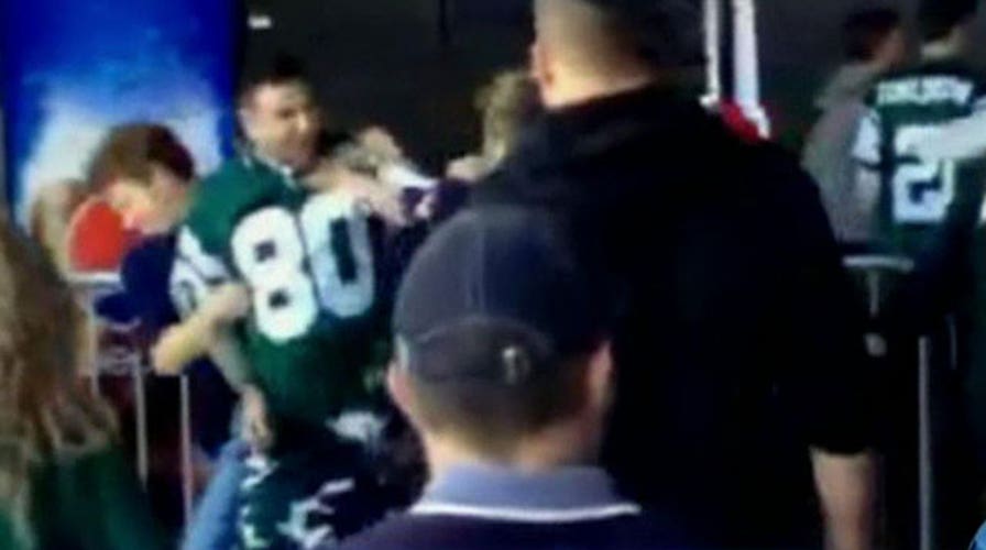 Woman punched in the face by Jets fan