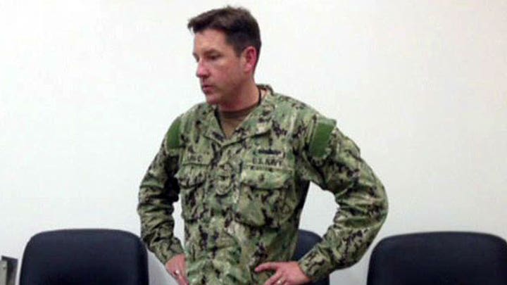 Newspaper issues correction about Navy captain's body type