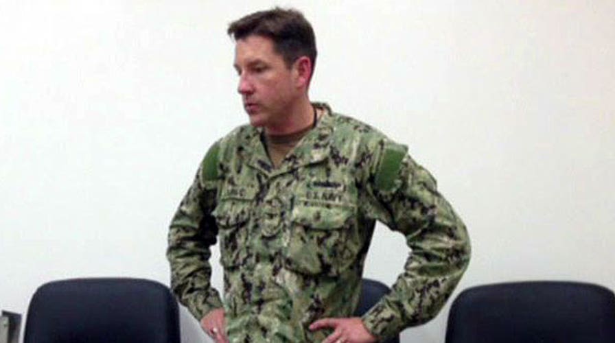 Newspaper issues correction about Navy captain's body type