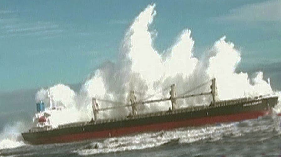 How does the U.S. Navy prepare for monster waves?