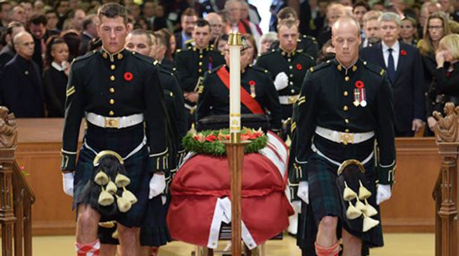 Thousands pay final respects to slain Canadian solider