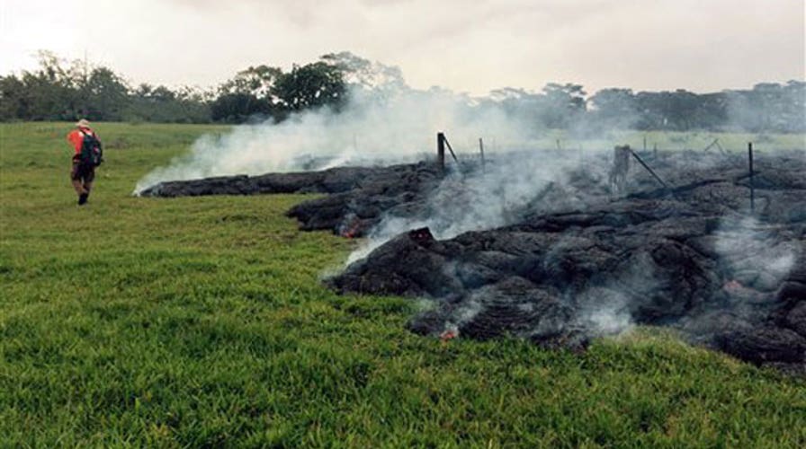 Lava flowing dangerously close to homes in Hawaii community