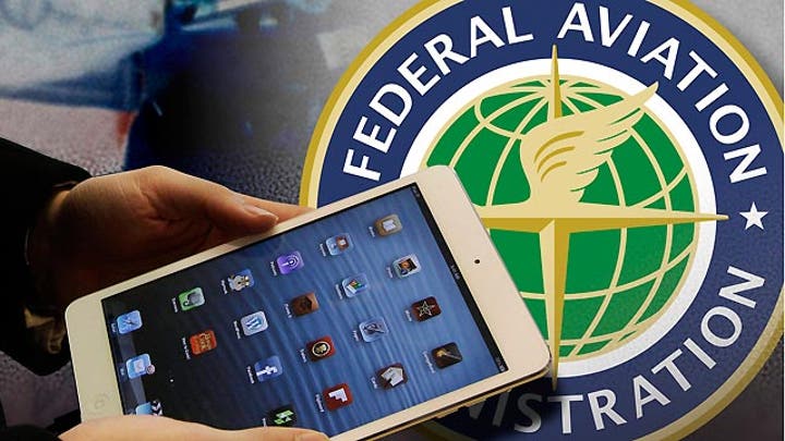FAA eases gadget restrictions on planes