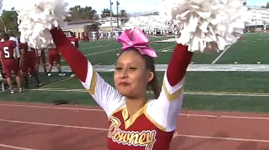 Deaf cheerleader defies odds to make competitive squad