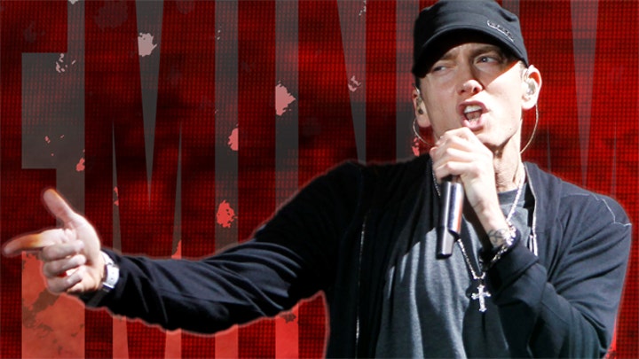 Eminem gives profanity-laced performance at concert for vets