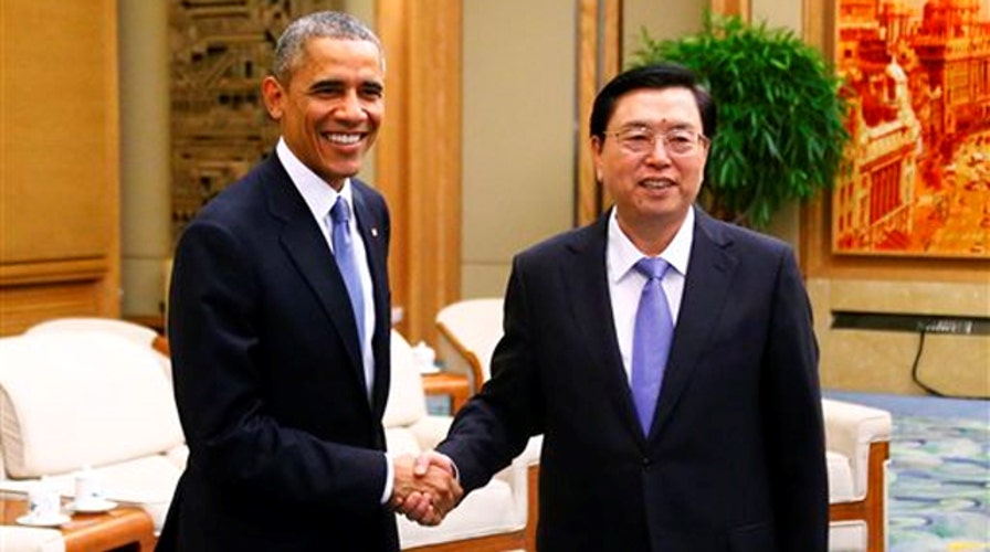 Critics slam US-China climate change deal