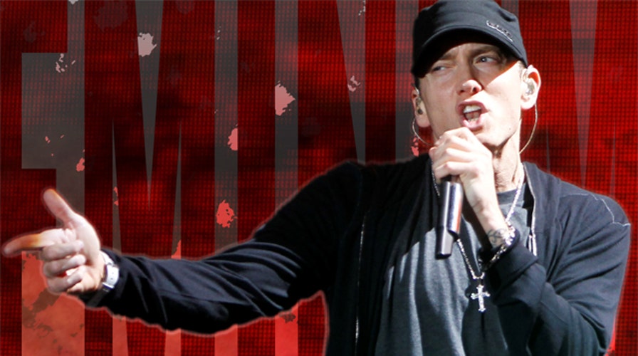 Eminem gives profanity-laced performance at concert for vets