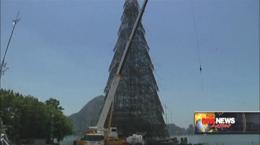 Finishing touches added to world's tallest Christmas tree