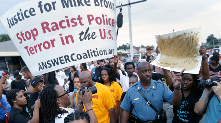 Ferguson braces for grand jury decision in Brown shooting