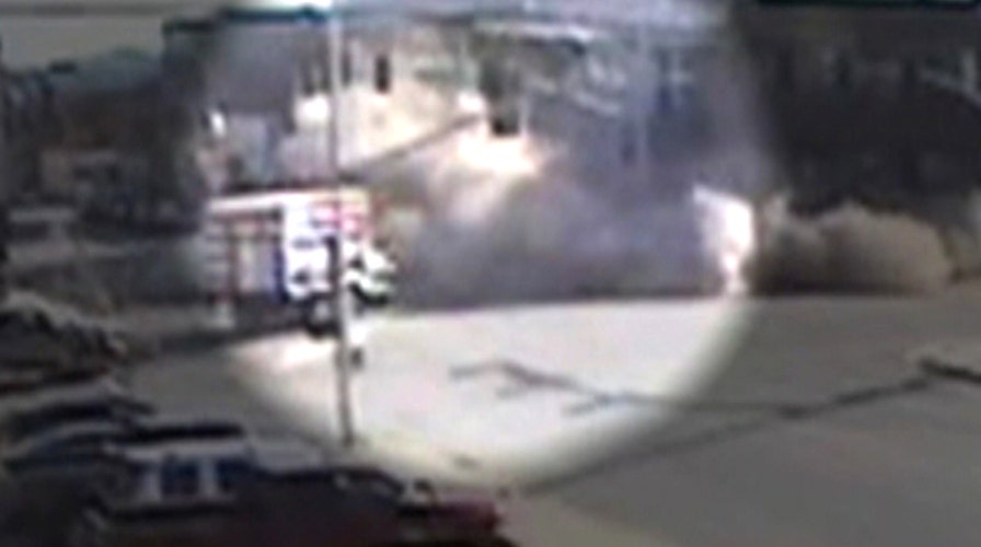 Stolen SUV crashes, building collapses