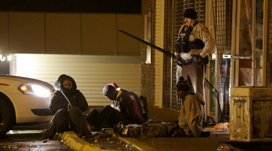 At least 29 arrested as protests turn violent in Ferguson