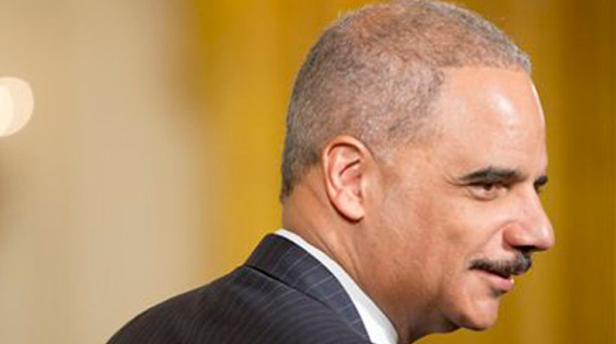 Eric Holder announces plan to end racial profiling by police