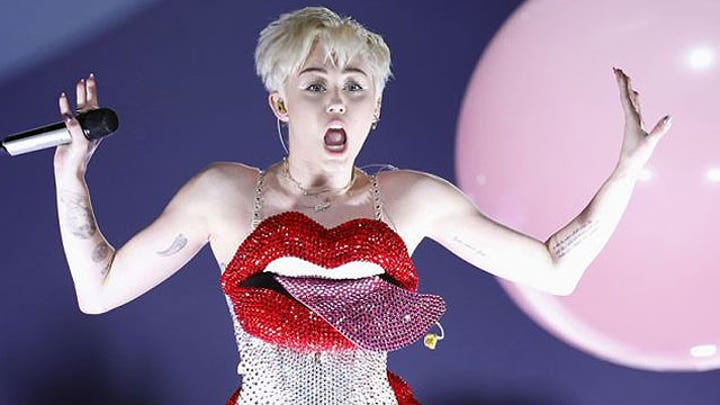 Miley gets wacky on stage