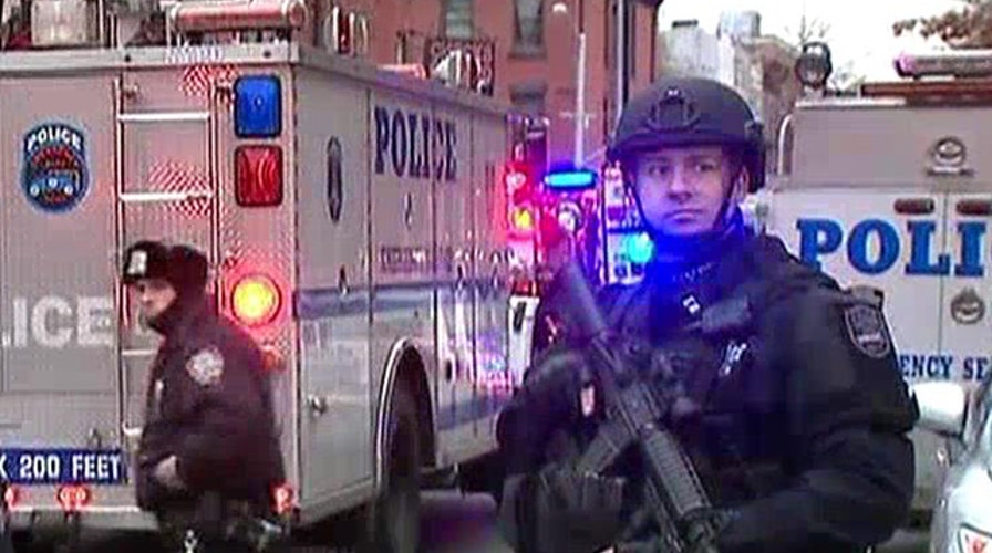 Two NYPD officers shot, one killed