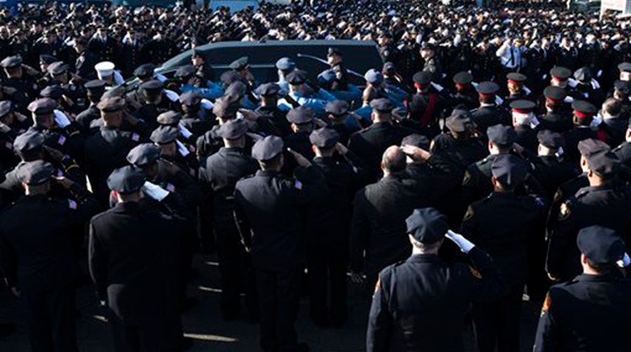 Thousands attend funeral of murdered NYPD Officer Ramos