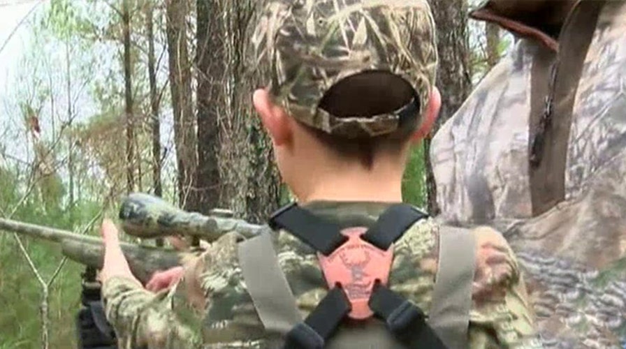 Sheriff takes young boy on first hunting trip