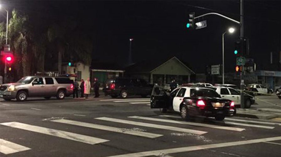 Police searching for gunman who fired on LAPD officers