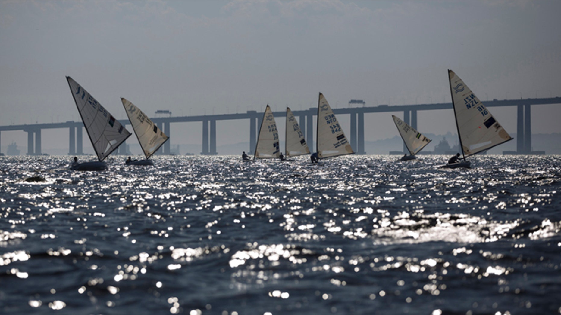 FILE - In this Aug. 3, 2014, file photo, athletes of the Finn class compete during the first test event for the Rio 2016 Olympic Games at the Guanabara Bay in Rio de Janeiro, Brazil. A drug-resistant super bacteria thats normally found in hospitals and is notoriously difficult to treat has been discovered in the waters where Rio de Janeiros Olympic sailing events will be held, scientists with Brazils most respected health research institute said Monday Dec. 15, 2014. (AP Photo/Felipe Dana, File)