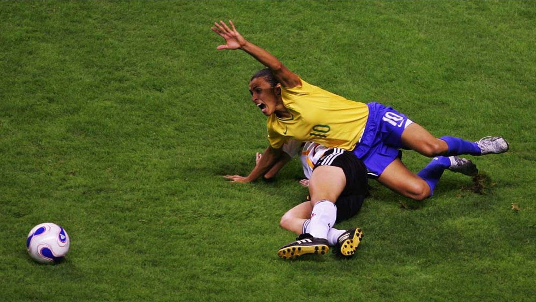 SHANGHAI, CHINA - SEPTEMBER 30: Marta (#10) of Brazil in action during the Women's World Cup 2007 final between Germany and Brazil at Shanghai Hongkou Football Stadium on September 30, 2007 in Shanghai, China. (Photo by Guang Niu/Getty Images)