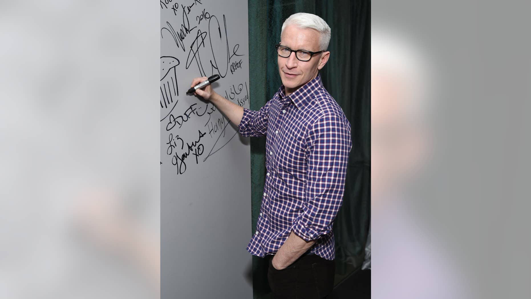 FILE - In this April 15, 2016 file photo, CNN News anchor Anderson Cooper appears at AOL's BUILD Speaker Series to discuss the HBO documentary, "Nothing Left Unsaid", at AOL Studios in New York. Cooper's name has been circulating as a possible replacement for Michael Strahan on the morning talk show, "Live! With Kelly and Michael." Strahan, who started in 2012, is leaving to work full-time at "Good Morning America" and ABC announced that his last day will be on May 13. (Photo by Evan Agostini/Invision/AP, File)
