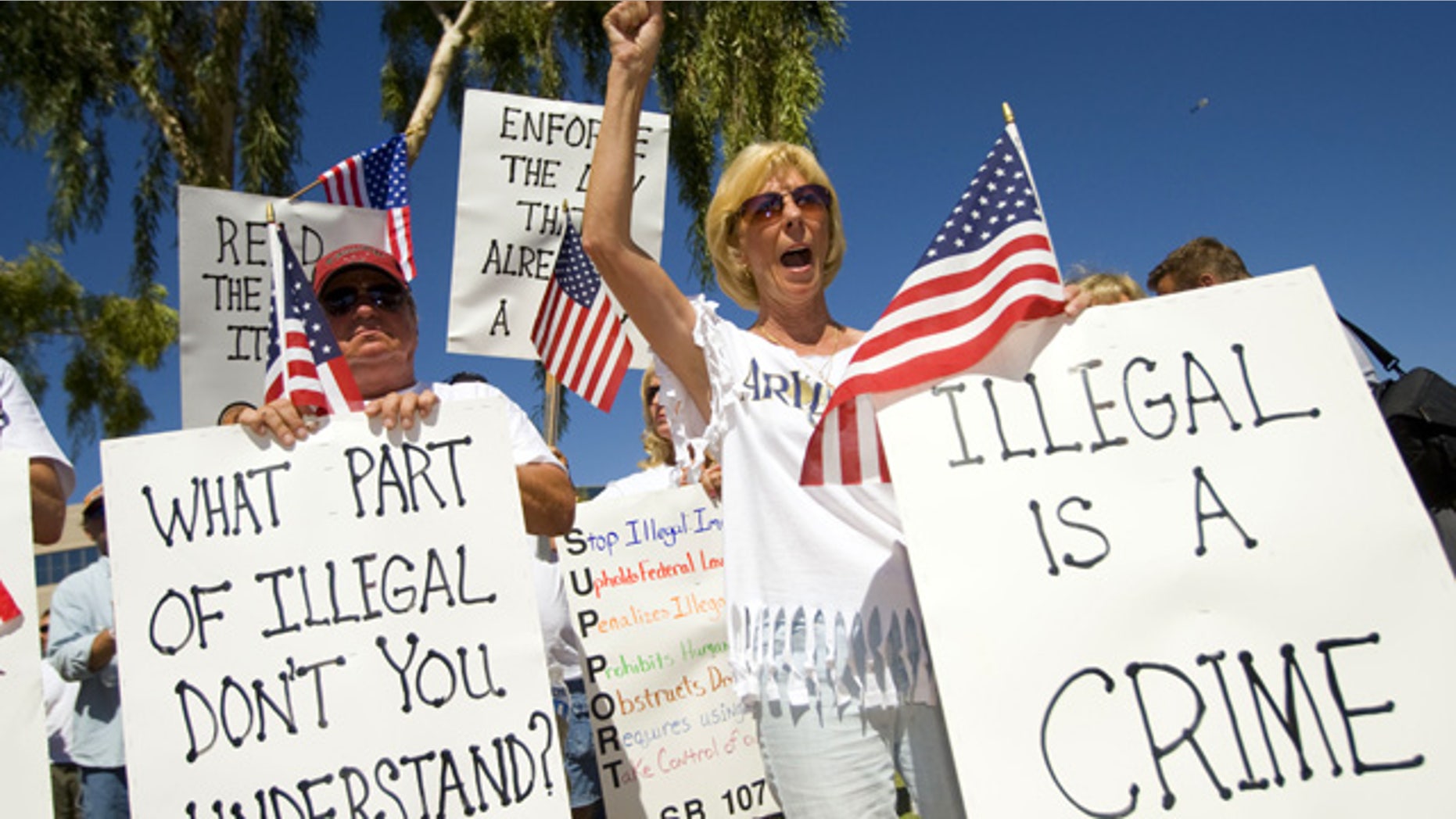 June 5: Arizona residents rally in support of the state's new immigration law near the state capitol in Phoenix.