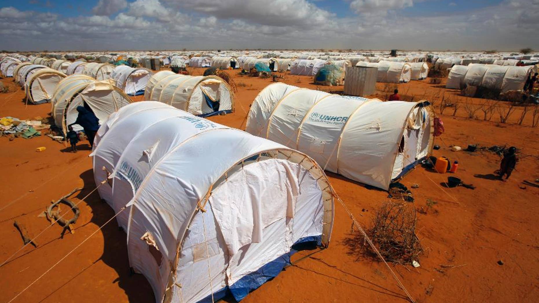 FILE - In this Friday, Aug. 5, 2011, file photo, tents are seen at the UNHCR's Ifo Extension camp outside Dadaab, eastern Kenya 62 miles from the Somali border.(AP Photo/Jerome Delay, File)