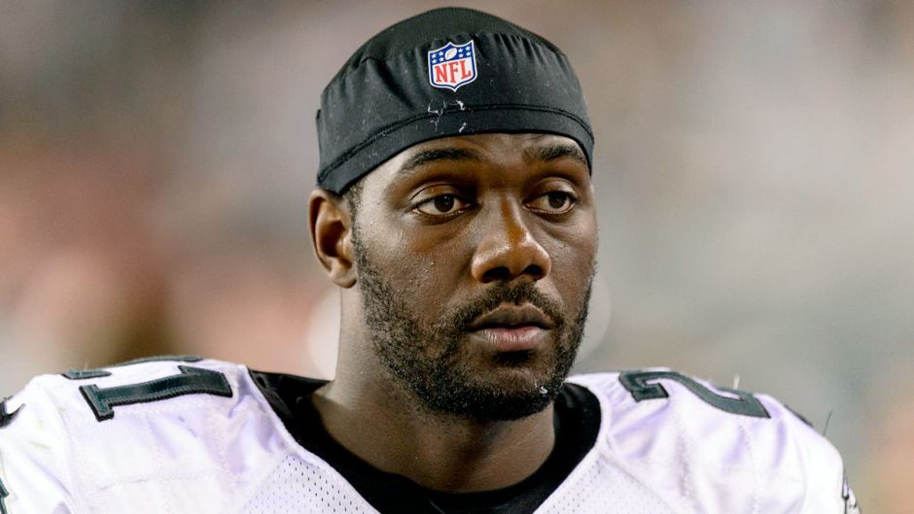 Aug 9, 2013; Philadelphia, PA, USA; Philadelphia Eagles safety Kenny Phillips (21) along the sidelines during the third quarter against the New England Patriots at Lincoln Financial Field. The Patriots defeated the Eagles 31-22. Mandatory Credit: Howard Smith-USA TODAY Sports