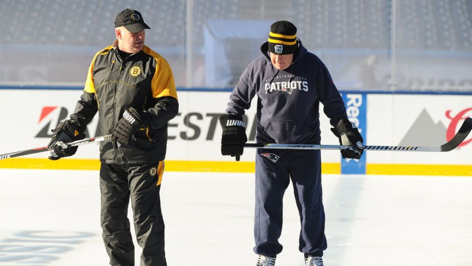 BOSTON, MA - DECEMBER 31 : New England Patriots head coach Bill Belichick and Boston Bruins head coach Claude Julien enjoy Practice Day on December 31, 2015 during 2016 Bridgestone NHL Winter Classic at Gillette Stadium in Foxboro, Massachusetts. (Photo by Steve Babineau/NHLI via Getty Images)
